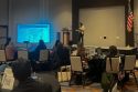 Tina Valdecanas, principal of Clarity of Place, presents an update on the Tourism Marketing District during the Visit Tuolumne County’s Tourism Summit on Oct. 17, 2024. (Photo by Visit Tuolumne County.)