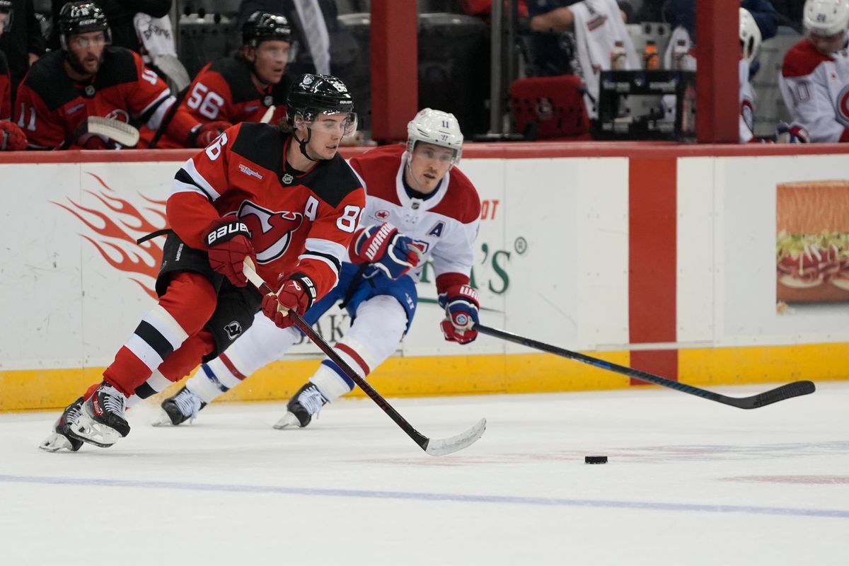 Jack Hughes has a goal and two assists as the Devils beat the Canadiens 5