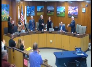 Jack Garamendi receives a standing ovation at Tuesday's board meeting
