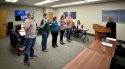 Newly elected board members take oath of office.