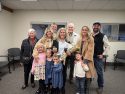 Juliana Feriani surrounded by family and friends at the TCBOE board Monday meeting