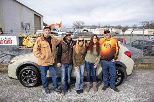 (L-R) Jack Jensen with Mother Lode Muscle Cars, mobile detailer Mark Emery, recipient Tracy Akins, Nancy Scott of Nancy's Hope, and Phil Hickenbottom