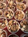 Adventist Health Sonora's Heart Month Field Trip at High Country Sports Arena in Sonora showing how to make healthy trail mix -- TCPH photo