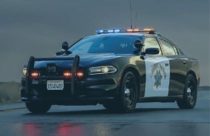 CHP vehicle in rain with lights on