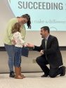 Paislee Gonzales, 2nd grader at Belleview Elementary takes award from Superintendent of Summerville Elementary School District Ben Howell-- TCACSA photo