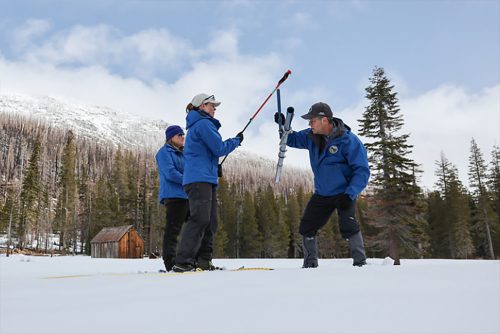 DWR officials conducting the April manual snowpack survey at the Phillips Station in Lake Tahoe