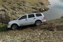 San Andreas CHP Unit photo of an SUV stuck near New Hogan Lake in the Valley Springs area of Calaveras County reminding drivers to obey all signage regarding private property