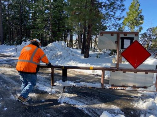Caltrans crew at gate on Highway 108 Sonora Pass—Caltrans photo