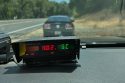San Andreas Unit CHP vehicle with radar clocking vehicle at 102 mph—CHP photo