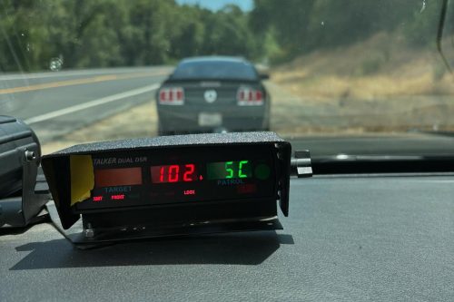 San Andreas Unit CHP vehicle with radar clocking vehicle at 102 mph—CHP photo