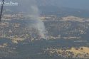 Vegetation fire in Calaveras County between Angels Camp and San Andreas near Fourth Crossing Road—PGE live camera