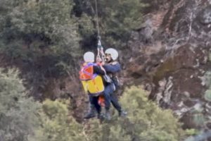 EPFD paramedic and injured woman being hoisted from the scene—CAL Fire TCU photo