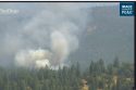 Vegetation fire in the Stanislaus National Forest near Buck Meadows—PGE live camera