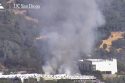 Vehicle fire into vegetation on HWY 108 in Sonora behind Crossroads Shopping Center—PGE live camera