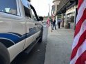 SPD officers put up flags along Washington Street in downtown Sonora as a symbol of unity and respect—SPD photo
