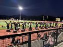 Summerville, plagued by penalties, loses to Calaveras as Cheerleaders cheer them on during the high school football game -- Photo by Tracey Petersen