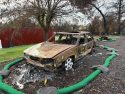 Burnt-out vehicles in the Complex Fires targeted for removal—TCPW photo