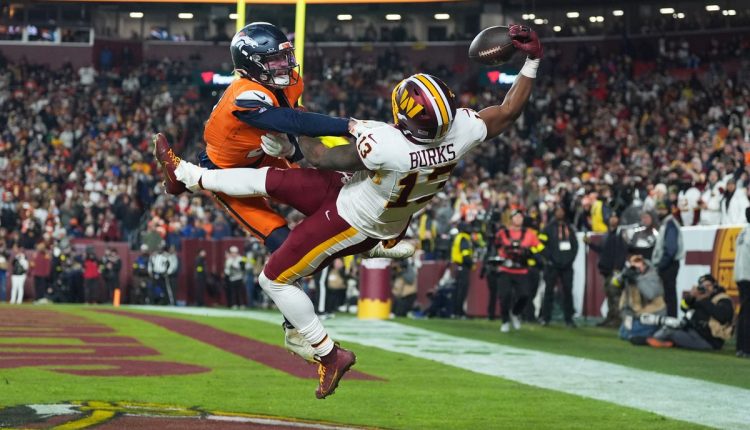 APTOPIX Broncos Commanders Football