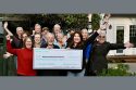 Habitat for Humanity Calaveras staff celebrating the anonymous donor check—Habitat for Humanity Calaveras photo