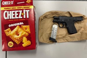 Cheez-It box and handgun seized in truck search—ACSO photo