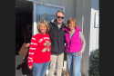 Central Sierra Broadcasting's Stephene Tune, BJ Hansen, and Karen Jensen at Interfaith Coat Drive