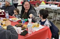 Many enjoying the Tuolumne County 42nd Community Christmas Eve Day Dinner in Sonora at the Mother Lode Fairgrounds—Photo by Tracey Petersen