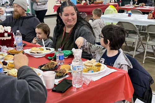 Many enjoying the Tuolumne County 42nd Community Christmas Eve Day Dinner in Sonora at the Mother Lode Fairgrounds—Photo by Tracey Petersen