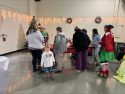 Many enjoying the Tuolumne County 42nd Community Christmas Eve Day Dinner in Sonora at the Mother Lode Fairgrounds—Photo by Tracey Petersen