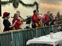 A live band entertains the crowd and keeps the holiday hits coming—Photo Tracey Petersen