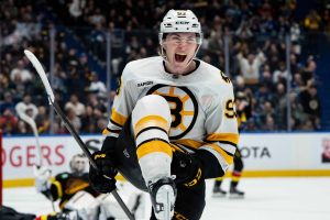 APTOPIX Bruins Canucks Hockey