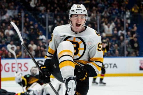 APTOPIX Bruins Canucks Hockey