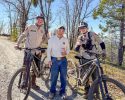 Iwata with the two unidentified TCSAR e-bike rescuers who found him—TCSO photo