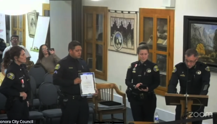 Starting at the left, Lt. Jennifer Hannula and Officer Rodolfo Figueroa receive recognition