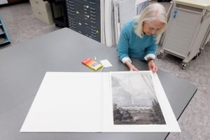 Library of Congress conservator Heather Wanser working on housing for a drawing of Yosemite created by artist Thomas Almond Ayres in 1855. Photo credit: Shawn Miller/Library of Congress.