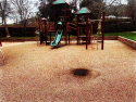 Playground damage visible at Woods Creek Rotary Park