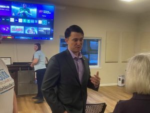 Michael Masuda speaks with supporters in Twain Harte