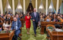 Cherilyn Bairos escorted by Heath Flora