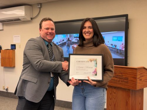 Superintendent Zack Abernathy congratulates Karina Herrera - TCSOS courtesy image