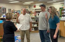 Photo by Trinity Baughn of Craig Pedro, Tyler Piche, Rachel Beckham being sworn in to Sonora Elementary School Board