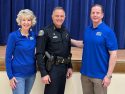 Johnny's Ambassadors with SPD Chief Turu Vanderweil. Laura Stack, CEO and founder of Johnny’s Ambassadors, left—SPD photo