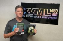 Maxx Wheeler with new book - Photo by BJ Hansen