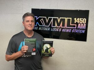 Maxx Wheeler with new book - Photo by BJ Hansen