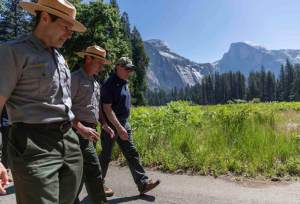 Doug Burgum walks with park rangers in Yosemite - Interior Department Image