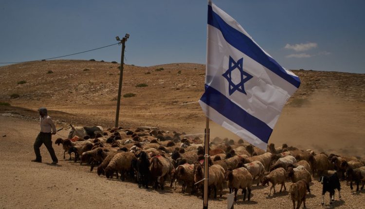 APTOPIX Palestinians West Bank Settlers Photo Essay