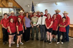Tuolumne County Sheriff David Vasquez (Center) with Black Oak Casino officials and athletes—Photo by Sam Persson