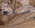 Inspecting Dove Fire impacts to identify potential hazards and determine what cleanup efforts may be needed—TCSO photo