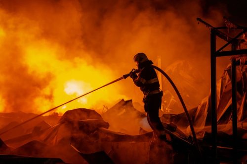 Photos show Russian attack on a warehouse in Kyiv