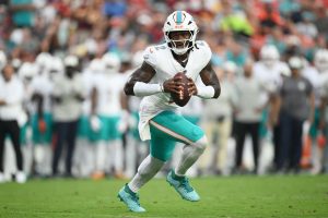 Dolphins Commmanders Football