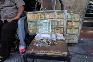 APTOPIX Iran Currency