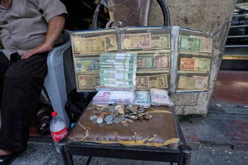 APTOPIX Iran Currency